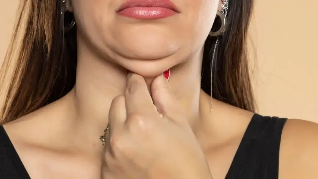 An image of a woman with double chin, sad, worried : Non Surgical Double Chin Removal Treatment in Shoreham by Sea, UK